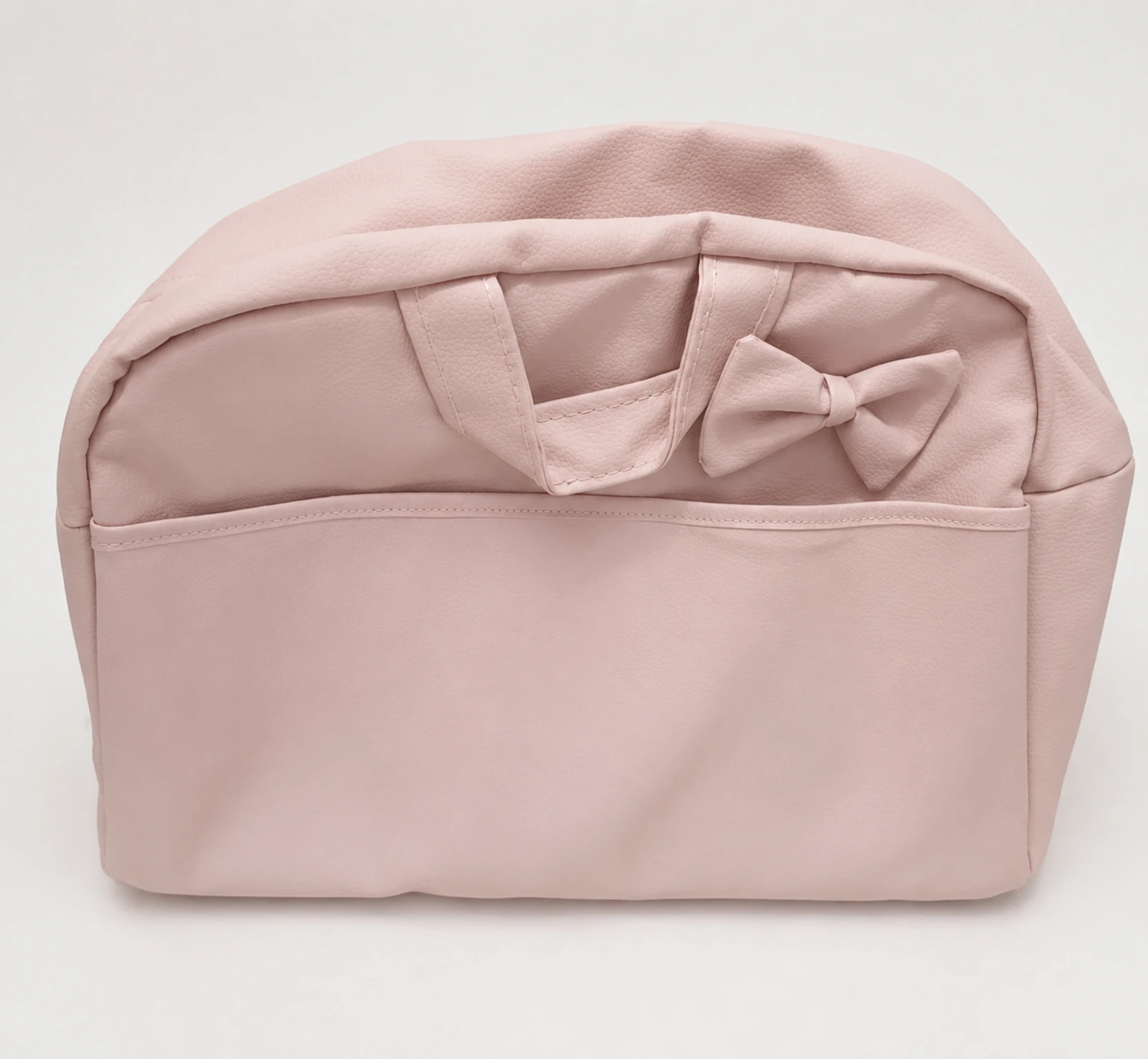 Bolso de maternidad o carro rosa con lazo